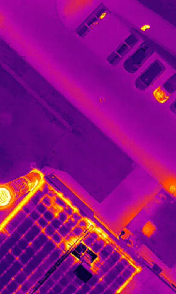Image taken with thermal camera attached to a flying drone. Each color represents different temperatures in cast iron spectrum, with darkest color is coolest and brighter color is warmest